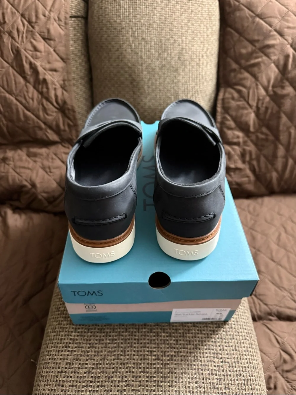 TOMS Black Leather Penny Loafers with Tan Welt and White Sole
